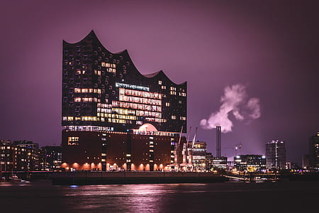 buildings with white lights during night time thumbnail