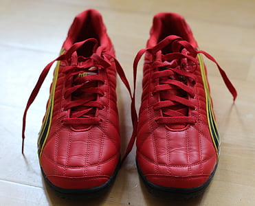 red-and-yellow Puma low-top sneakers thumbnail