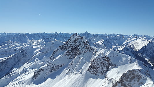 bird's-eye view of snow covered mountain thumbnail