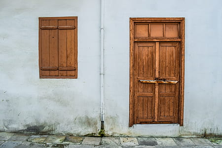 brown wooden door near window pane thumbnail