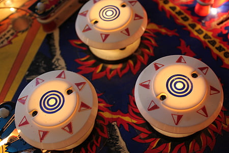 three white pinball bumpers thumbnail