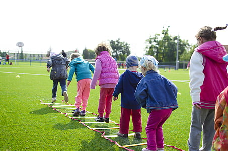 people, field, playing, grass thumbnail