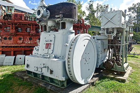 white metal equipment on grass field thumbnail