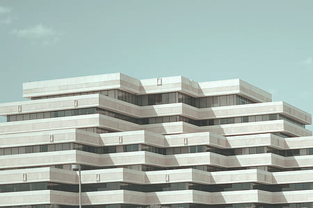 architectural photography of white building thumbnail