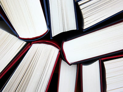 assorted-color hard bound books thumbnail