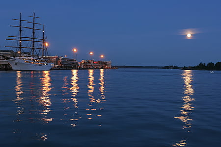 white yacht on body of water thumbnail