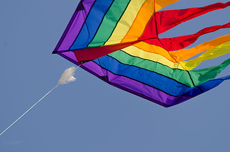 multi-colored kite on sky thumbnail