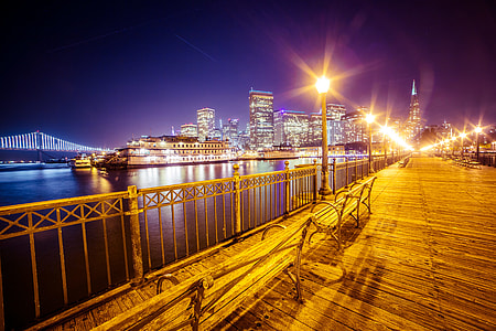 Old Pier and San Francisco Skyline with Bay Bridge at Night thumbnail