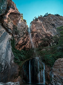 Low Angle Photography Of Waterfalls thumbnail