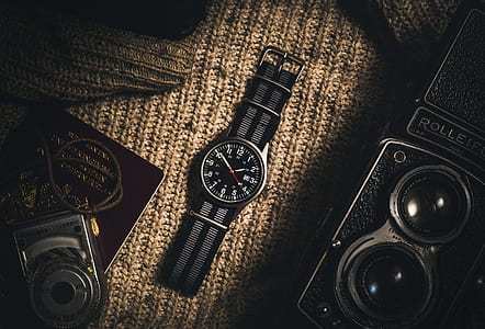 round black and gray analog watch with gray band thumbnail