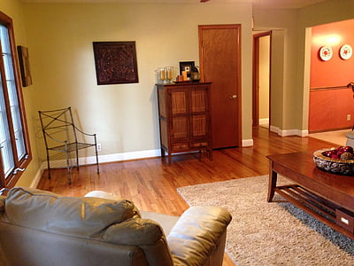 rectangular brown wooden coffee table near brown sofa chair thumbnail