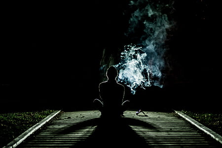 person facing back with smoke thumbnail