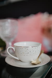 Porcelain and glass dishware on the glass table thumbnail