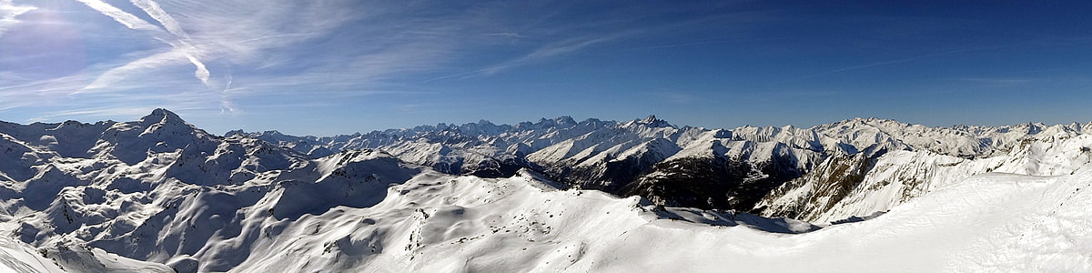 photography of mountain with snow during daytime thumbnail