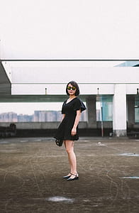 woman standing on floor thumbnail