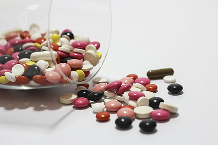 assorted-color medicine capsules thumbnail