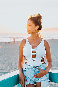 woman at gray fence thumbnail
