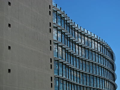 grey and clear glass high-rise building during daytime thumbnail