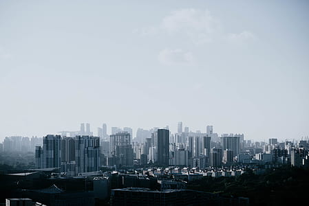 photo of building under white clouds at daytime thumbnail