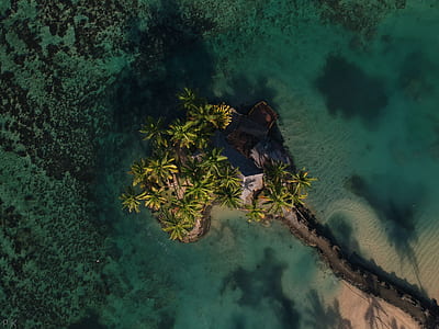 aerial photo of island during daytime thumbnail