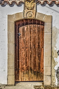 brown wooden door close during daytime thumbnail