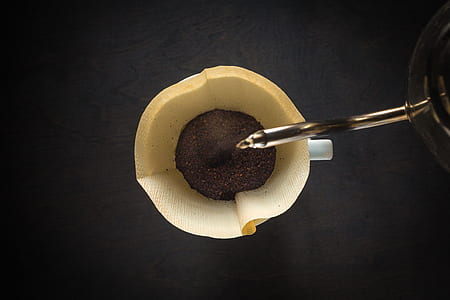 top-view photography of coffee powder in beige cup thumbnail