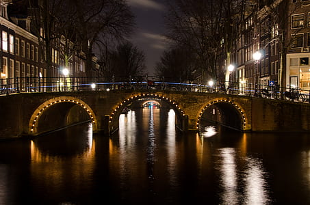 brown concrete bridge between two buildings thumbnail