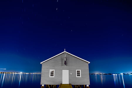 grey and white wooden house thumbnail