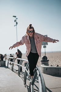 person wearing pink jacket thumbnail