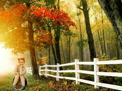 woman sitting near the tree thumbnail