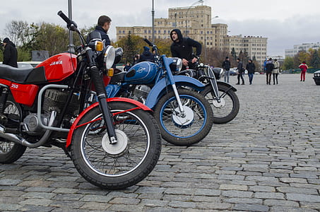 two men sitting on motorcycle thumbnail