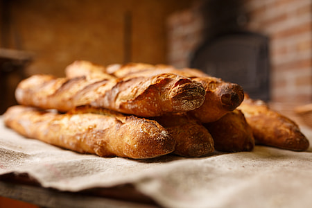 six bread on gray textile thumbnail