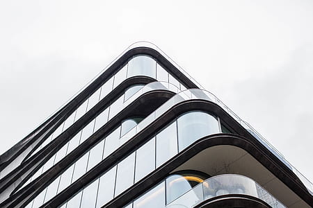 low angle photograph of glass building thumbnail