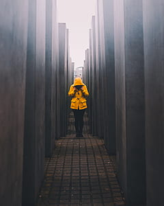 photo of person wearing yellow hoodie thumbnail