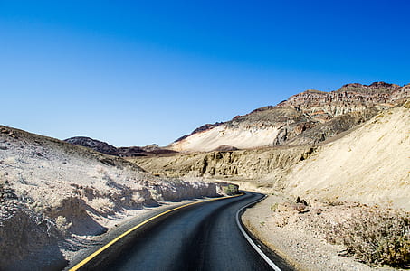 asphalt road during day time thumbnail