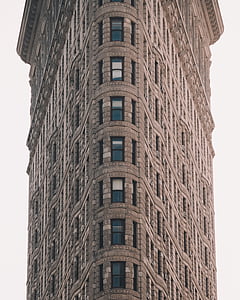 beige concrete high-rise building at daytime thumbnail