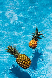 Pineapple in a swimming pool thumbnail