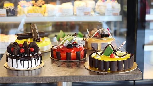 five round assorted-color cakes thumbnail