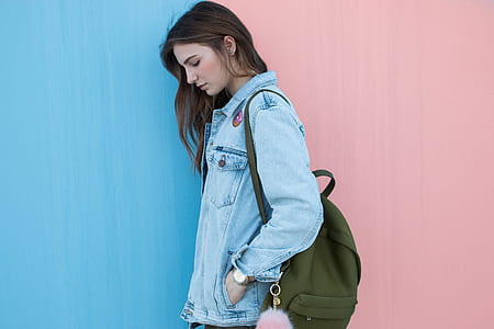 woman wearing blue denim button-up jacket thumbnail