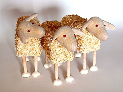 three brown sheep figurines on white surface thumbnail