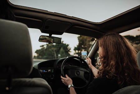 woman driving vehicle thumbnail