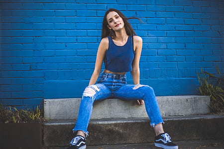 woman sitting on gray concrete thumbnail