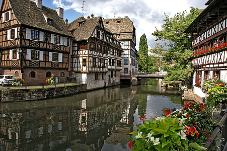 village and bridge during day thumbnail