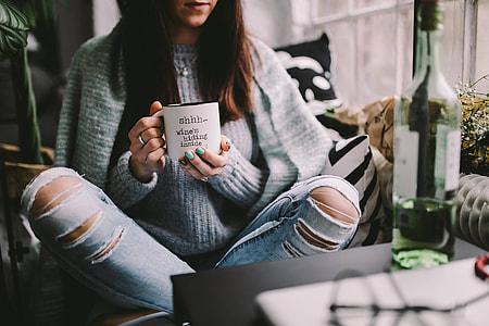 Girl drinking wine in her mug thumbnail
