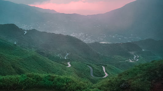 aerial view of green mountain and road thumbnail