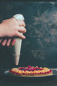 person holding pastry bag thumbnail