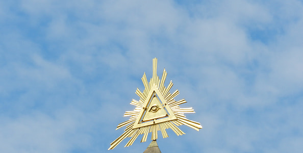 close-up photo of gold all seeing eye decor thumbnail