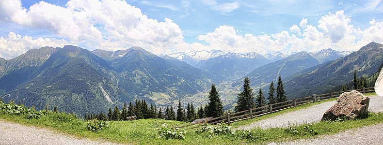 green trees across mountains during daytime thumbnail