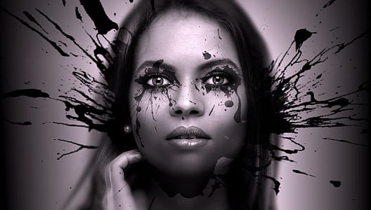 woman's face with black ink thumbnail