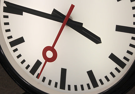 round white and black analog clock at 3:45 thumbnail